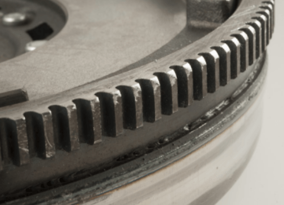 DMF starter ring gears heavily worn or broken.