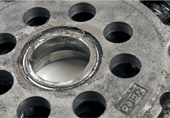 Grease egress, sealing cap missing or discolored brown due to overload. 