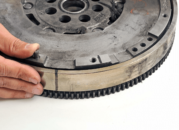 Secondary flywheel free to rotate beyond permissible free movement.